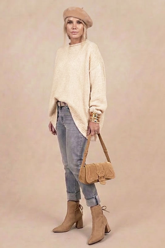 Dress ankle boots back laces in tan beige leather with high flare heels and tapered toe - Worn view